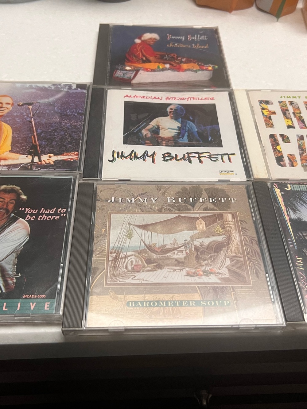 Lot of 7 Jimmy Buffett CDs Fruitcakes Christmas Island Barometer Soup Lizard +
